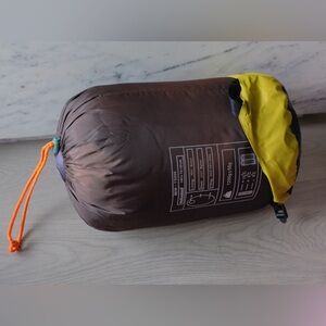 Brown and Yellow Nylon Sleeping Bag
